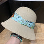 Sommerlicher Sonnenhut mit Schleife und breiter Krempe – ShadeRibbon