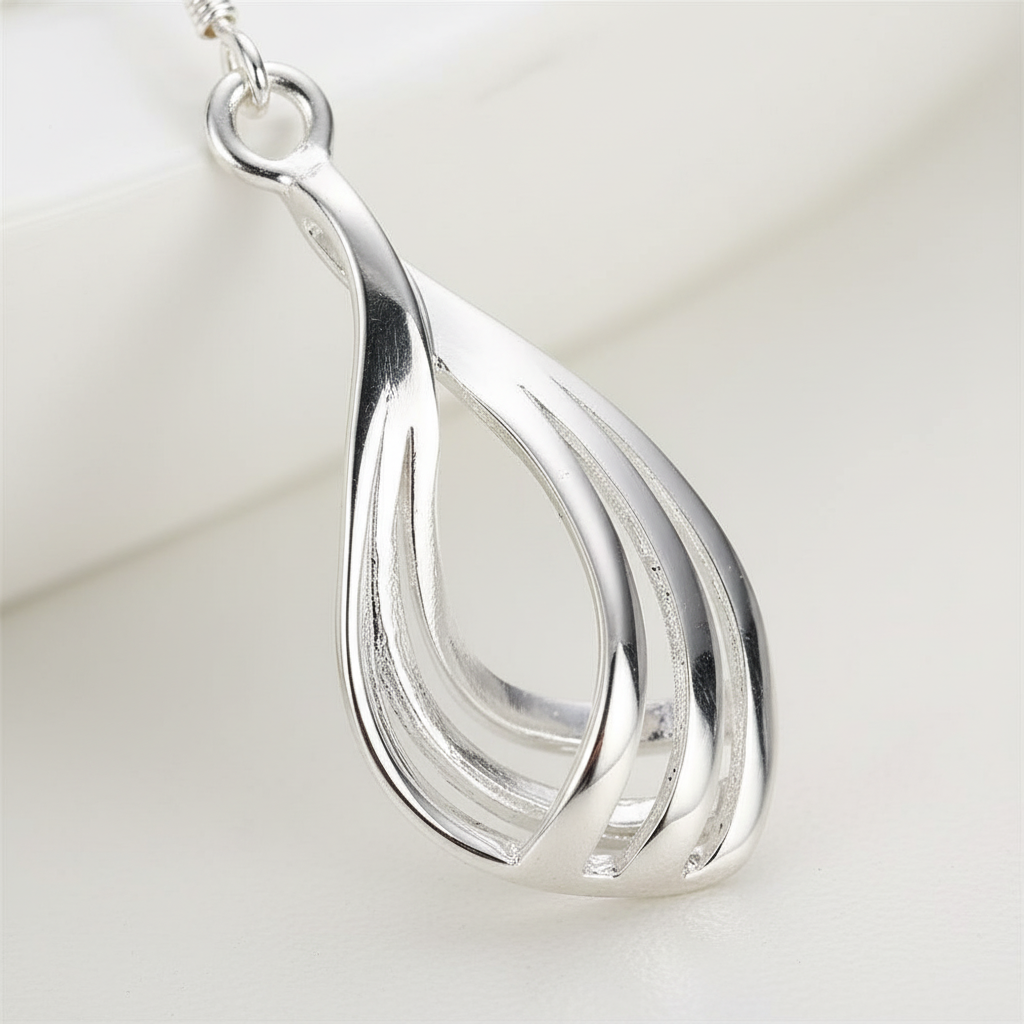 Hängende Tropfenohrringe - DropCharm 