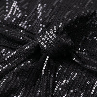 Schwarzes Paillettenkleid, Nahaufnahme, glänzend, elegant, Abendmode, festlich, Damenmode.