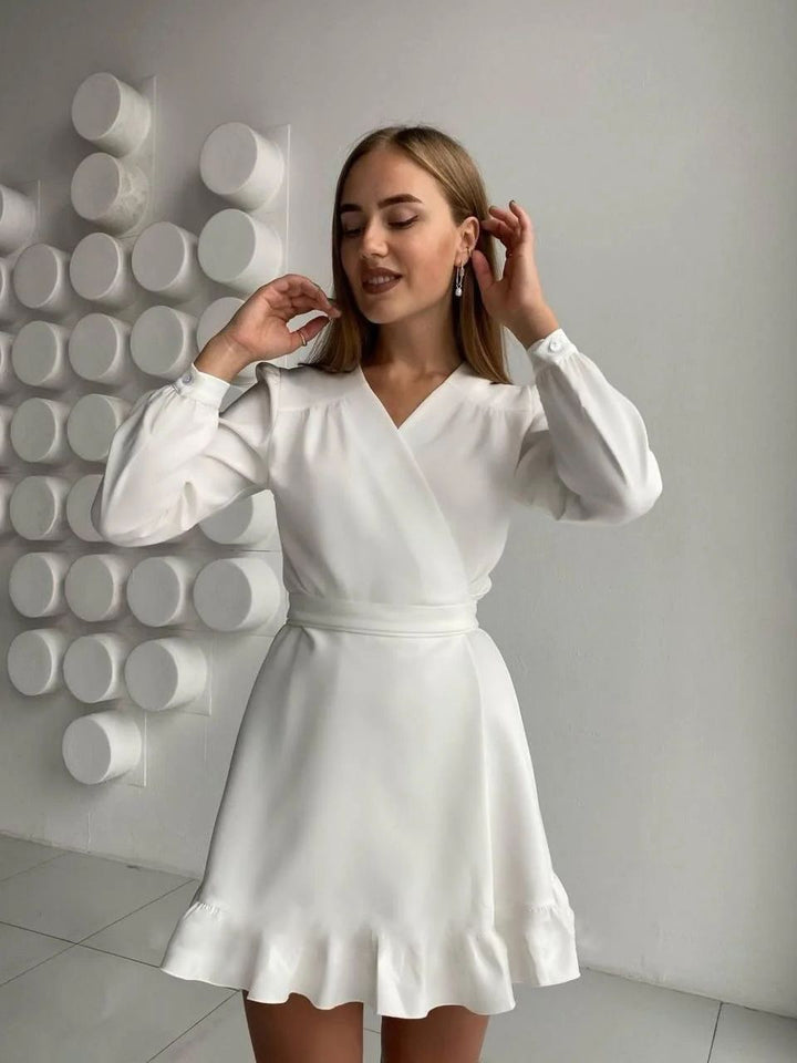 Elegantes Damenkleid mit Rüschen und Wickeloptik kaufen-Luzern Mode