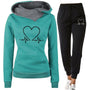 Damen Jogginganzug | 2-teilig | Herzprint | Kapuze | Locker sitzend | Warm-Grün-S-Luzern Mode