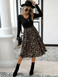Elegantes Damenkleid mit Blumenmuster und Langarm-Design-Luzern Mode