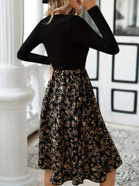 Elegantes Damenkleid mit Blumenmuster und Langarm-Design-Luzern Mode