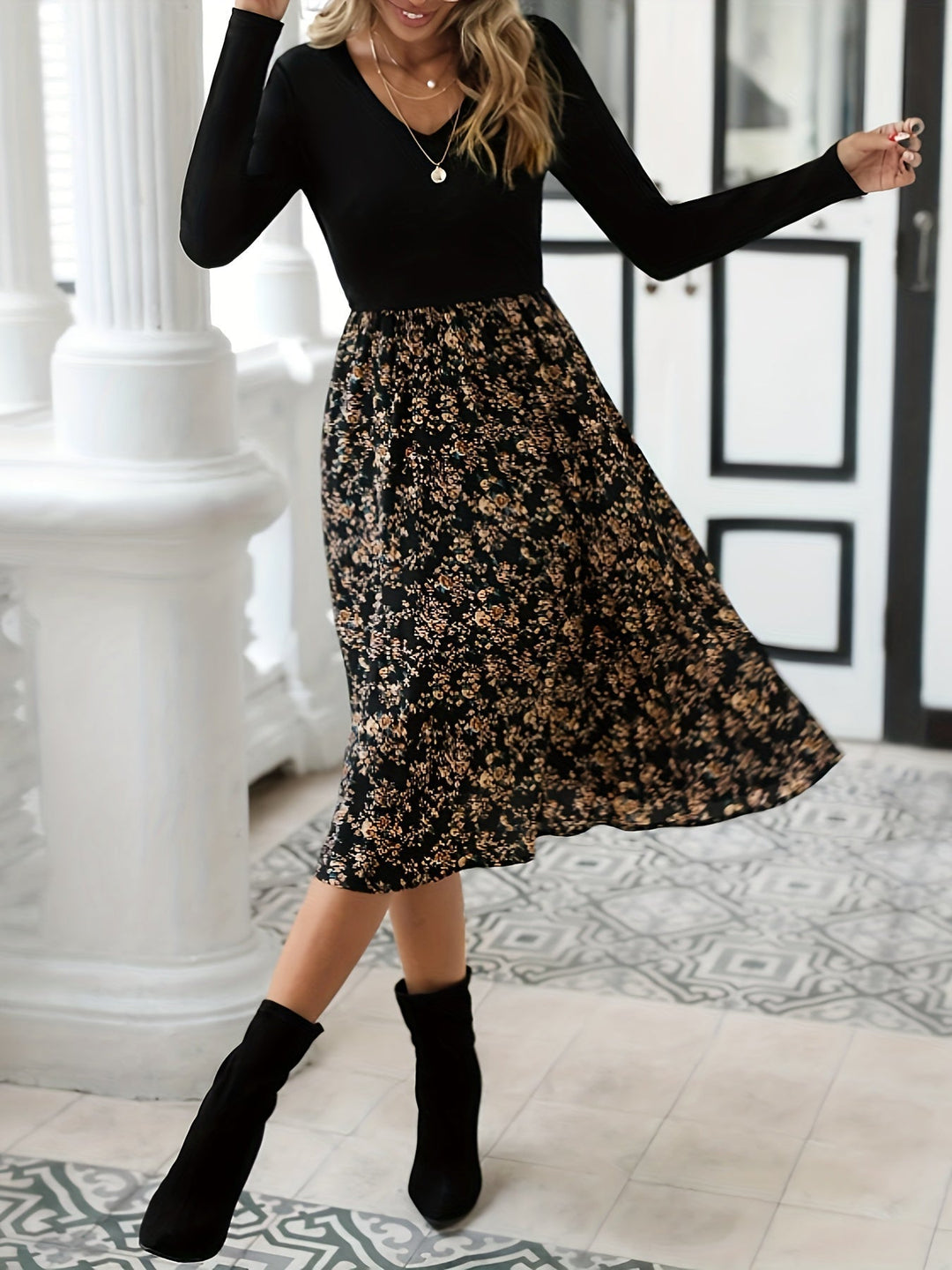 Elegantes Damenkleid mit Blumenmuster und Langarm-Design-Luzern Mode
