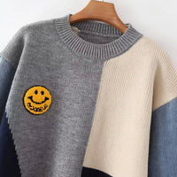 Unisex Patchwork Pullover mit Smiley-Design und Denim-Ärmeln-Luzern Mode