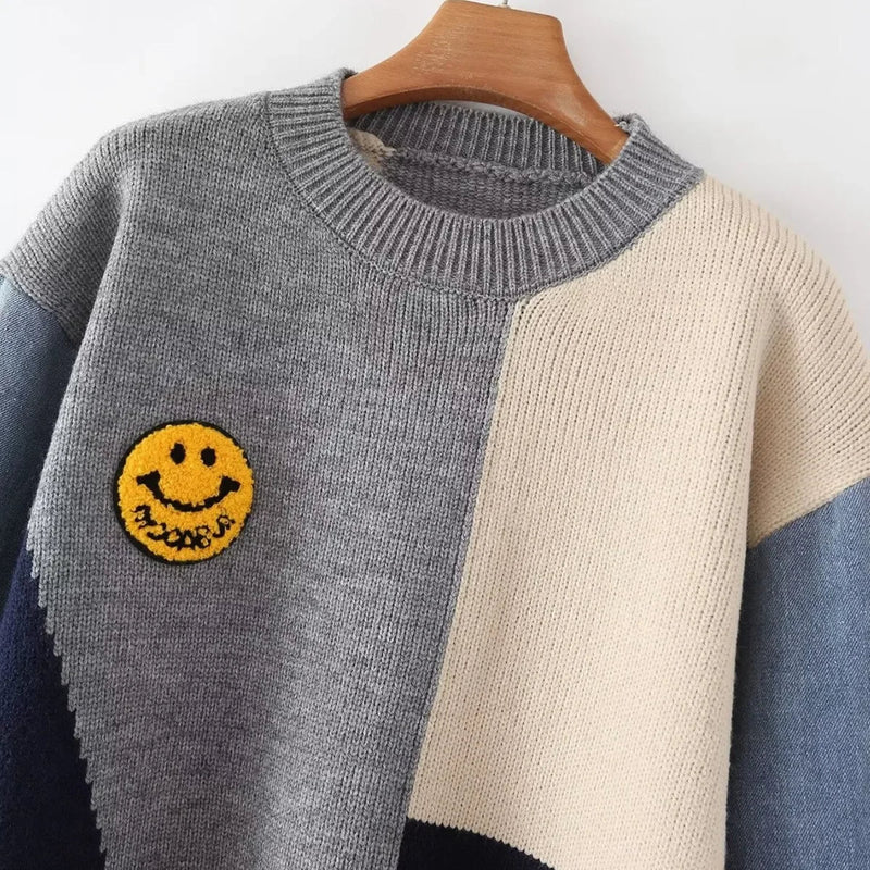 Unisex Patchwork Pullover mit Smiley-Design und Denim-Ärmeln-Luzern Mode