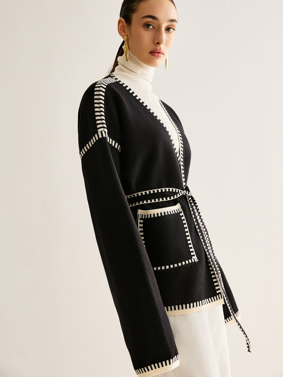 Eleganter Damen Strickcardigan mit Taschen und Gürtel-Detail-Luzern Mode