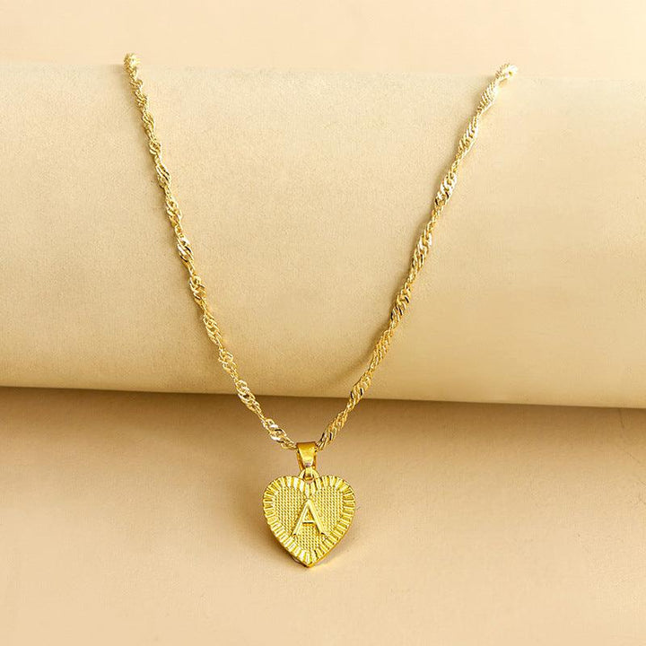 Halskette mit Herz Anhänger | Initiale | Liebe | Gold | Stilvoll | Langlebig | Geschenk-A-Luzern Mode