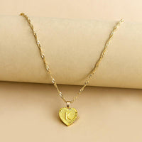 Halskette mit Herz Anhänger | Initiale | Liebe | Gold | Stilvoll | Langlebig | Geschenk-K-Luzern Mode