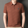Luxuriöser Designerstoff mit Monogramm-Muster für Modeprojekte-Braun-S-Luzern Mode