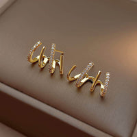 Illusie Ohrringe | Vier Ringe | Zirkonia | Silber | Vergoldet | Clip-Luzern Mode