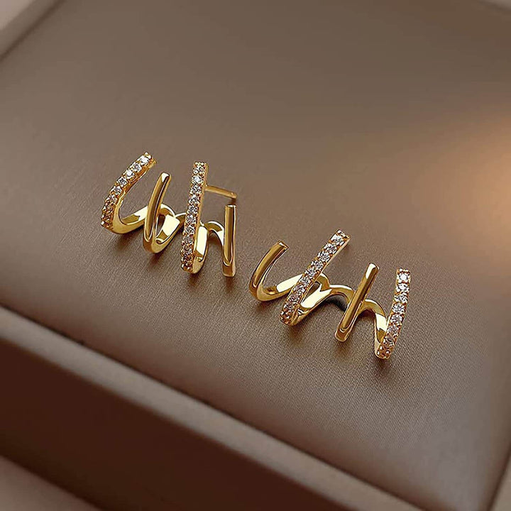 Illusie Ohrringe | Vier Ringe | Zirkonia | Silber | Vergoldet | Clip-Luzern Mode
