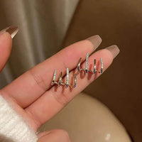 Illusie Ohrringe | Vier Ringe | Zirkonia | Silber | Vergoldet | Clip-Luzern Mode