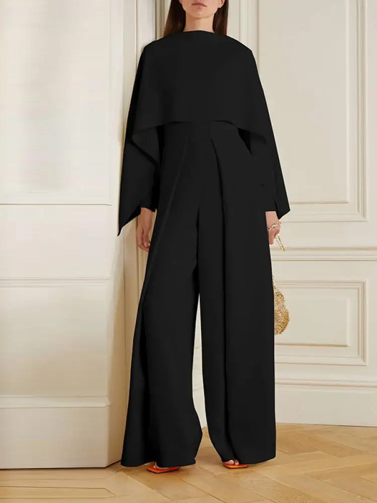 Damen Eleganter Jumpsuit mit Weitem Bein und Cape-Design-Schwarz-S-Luzern Mode