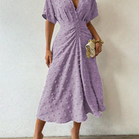 Elegantes Damenkleid mit V-Ausschnitt und Raffung Design-Luzern Mode