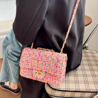 Damen Handtasche aus Tweed mit Kettenriemen und Schloss-Luzern Mode