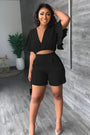 Gefaltetes Crop-Top | tiefer V-Ausschnitt | High-Waist Shorts | luftiger Stoff | Taschen-Schwarz-S-Luzern Mode