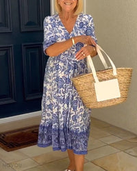 Kleid mit Blumenmuster | Über das Knie | V-Ausschnitt | A-Linie | Kurze Ärmel-Blau-S-Luzern Mode