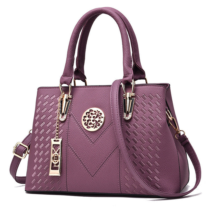 Luxuriöse Damen Handtasche mit elegantem Design und Anhänger-Lila-Luzern Mode